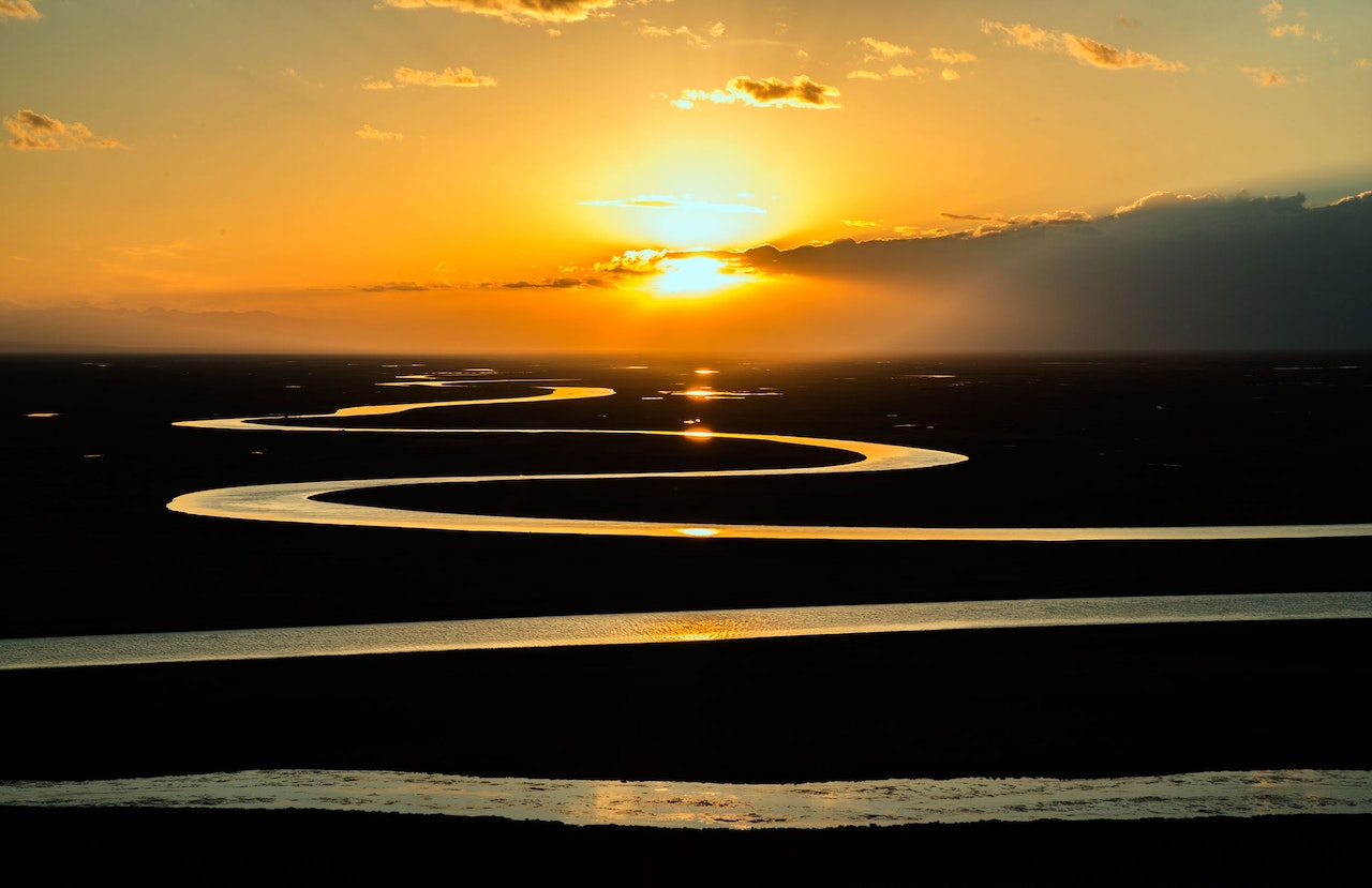 Sunset On A Winding River